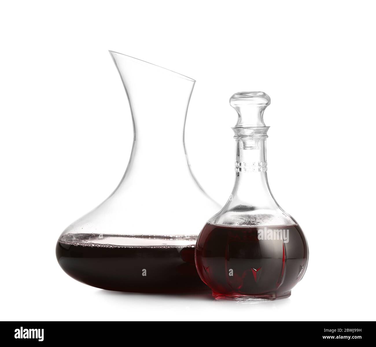 Decanters of wine on white background Stock Photo