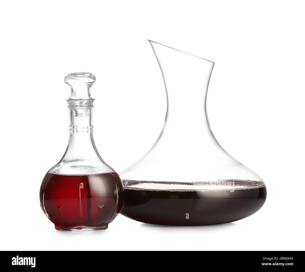 Decanters of wine on white background Stock Photo