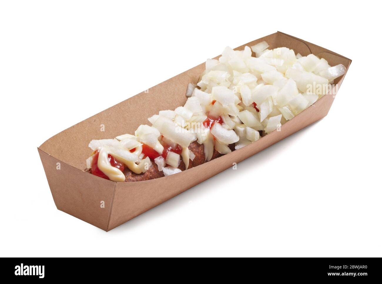 One frikadel with ketchup, mayonnaise on chopped onions, a Dutch fast food snack called 'frikadel speciaal', the Netherlands Stock Photo