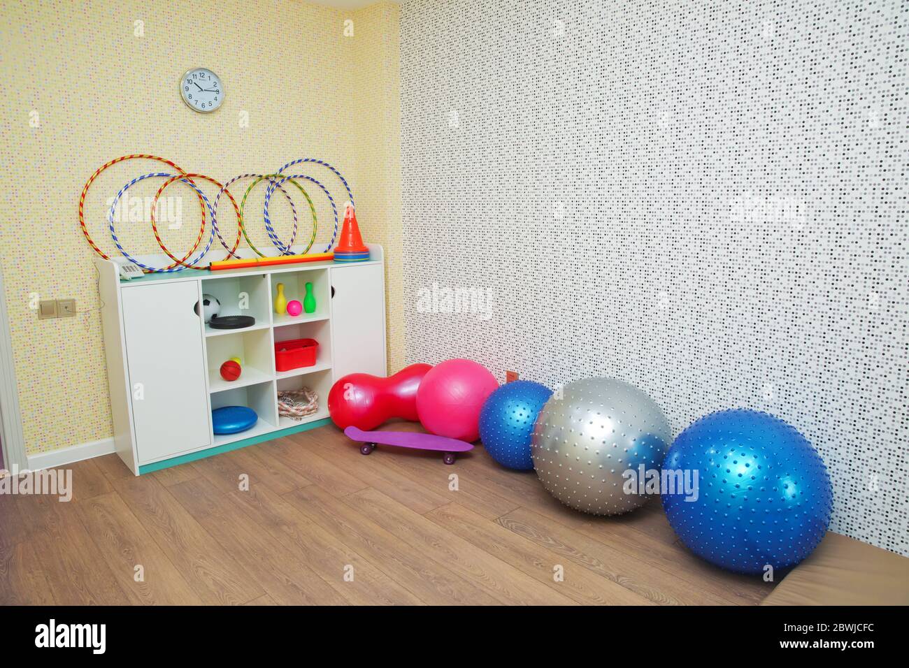 Gym room in kindergarten sports gym Indoor play area Large bouncy spiky ball Gym Yoga Balls White wardrobe. gymnastic instruments Stock Photo Alamy