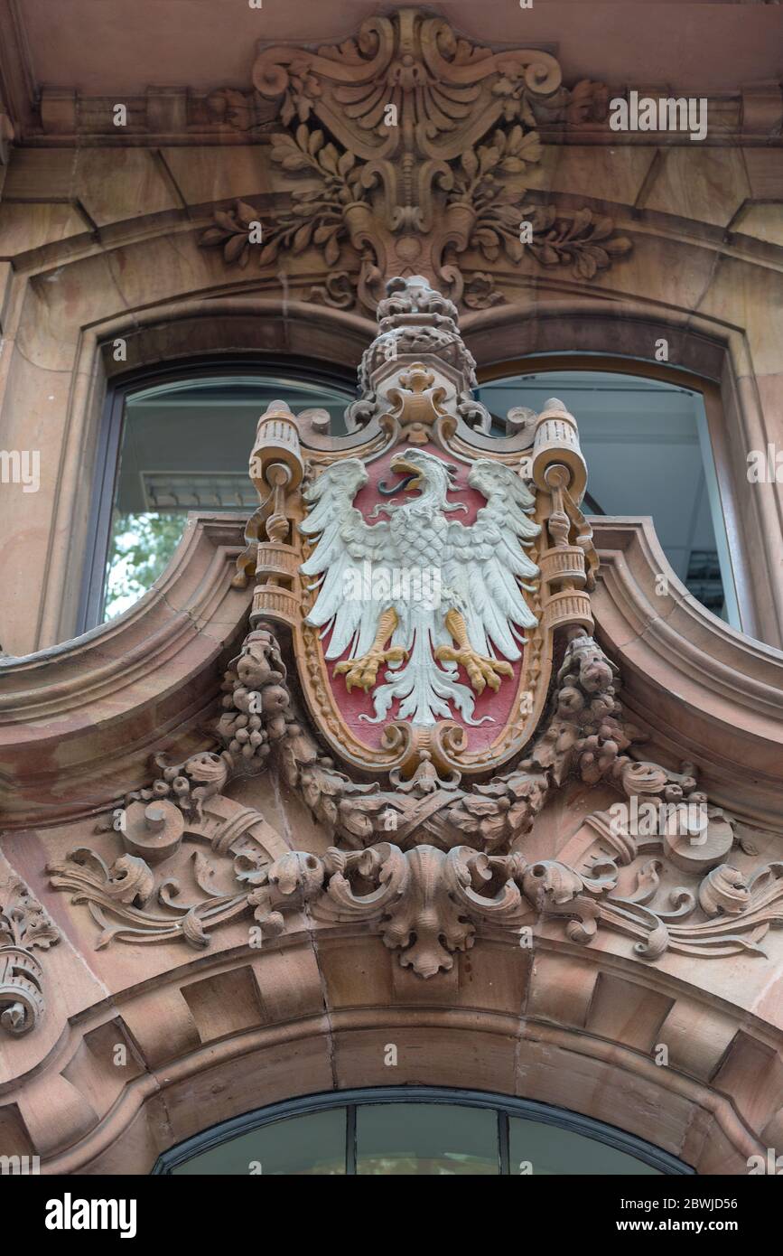 colored sandstone coat of arms above the entrance of a house in Frankfurt, Germany Stock Photo