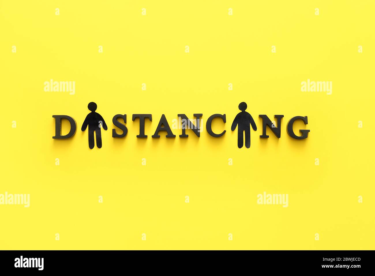 Human figures with word DISTANCING on color background Stock Photo - Alamy
