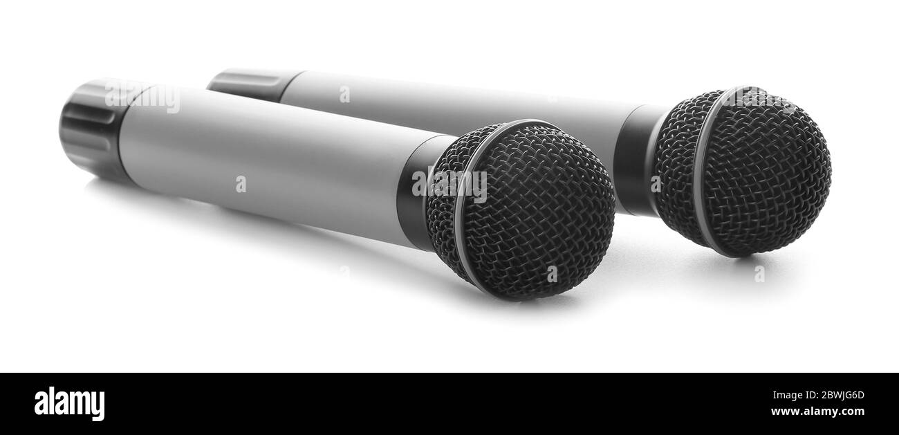 Modern microphones on white background Stock Photo