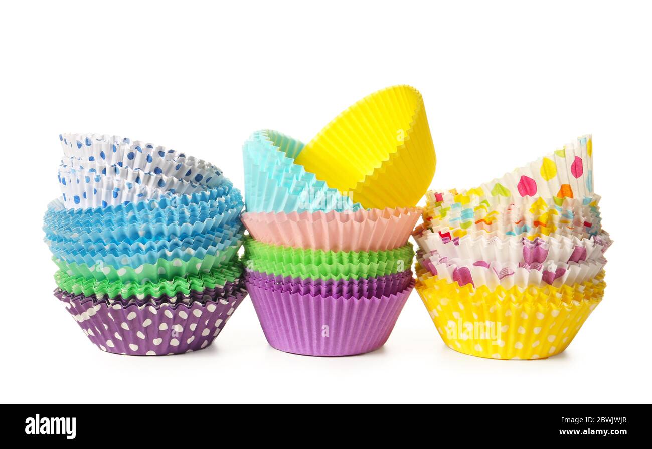 Muffin baking cups on white background Stock Photo