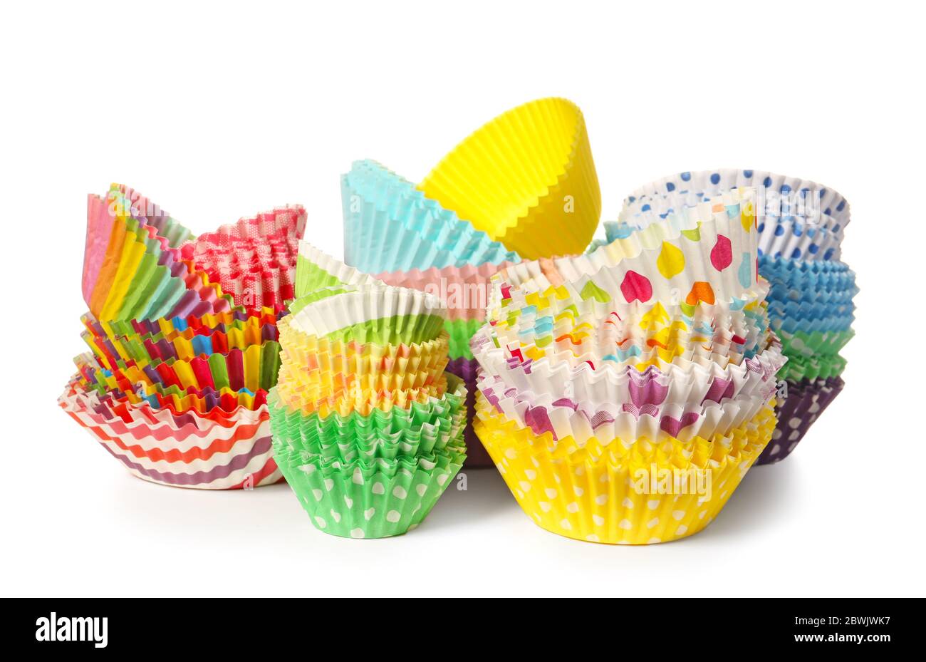 Muffin baking cups on white background Stock Photo