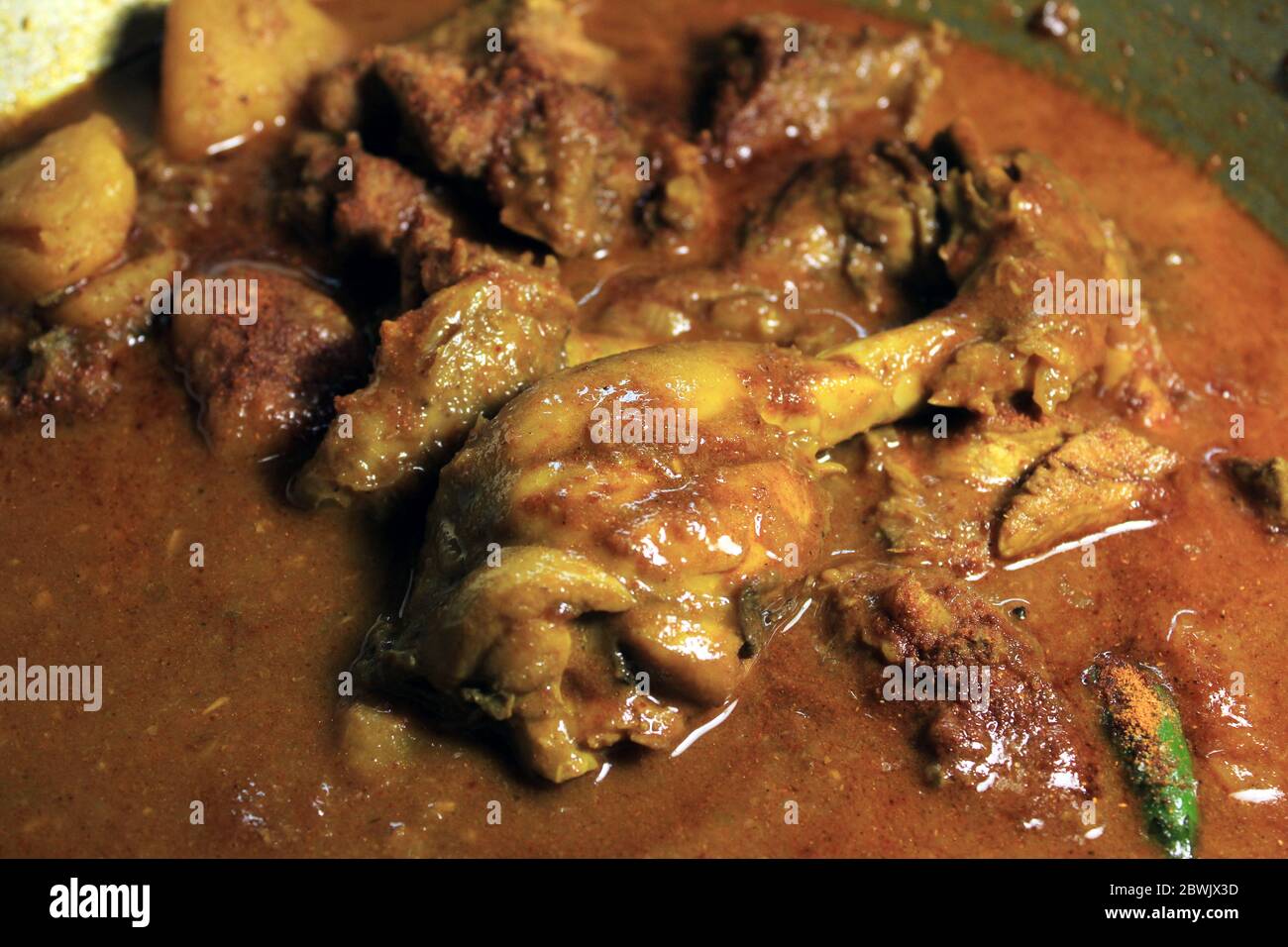 Boiled chicken broth. Hot and spicy Chicken Curry Stock Photo - Alamy