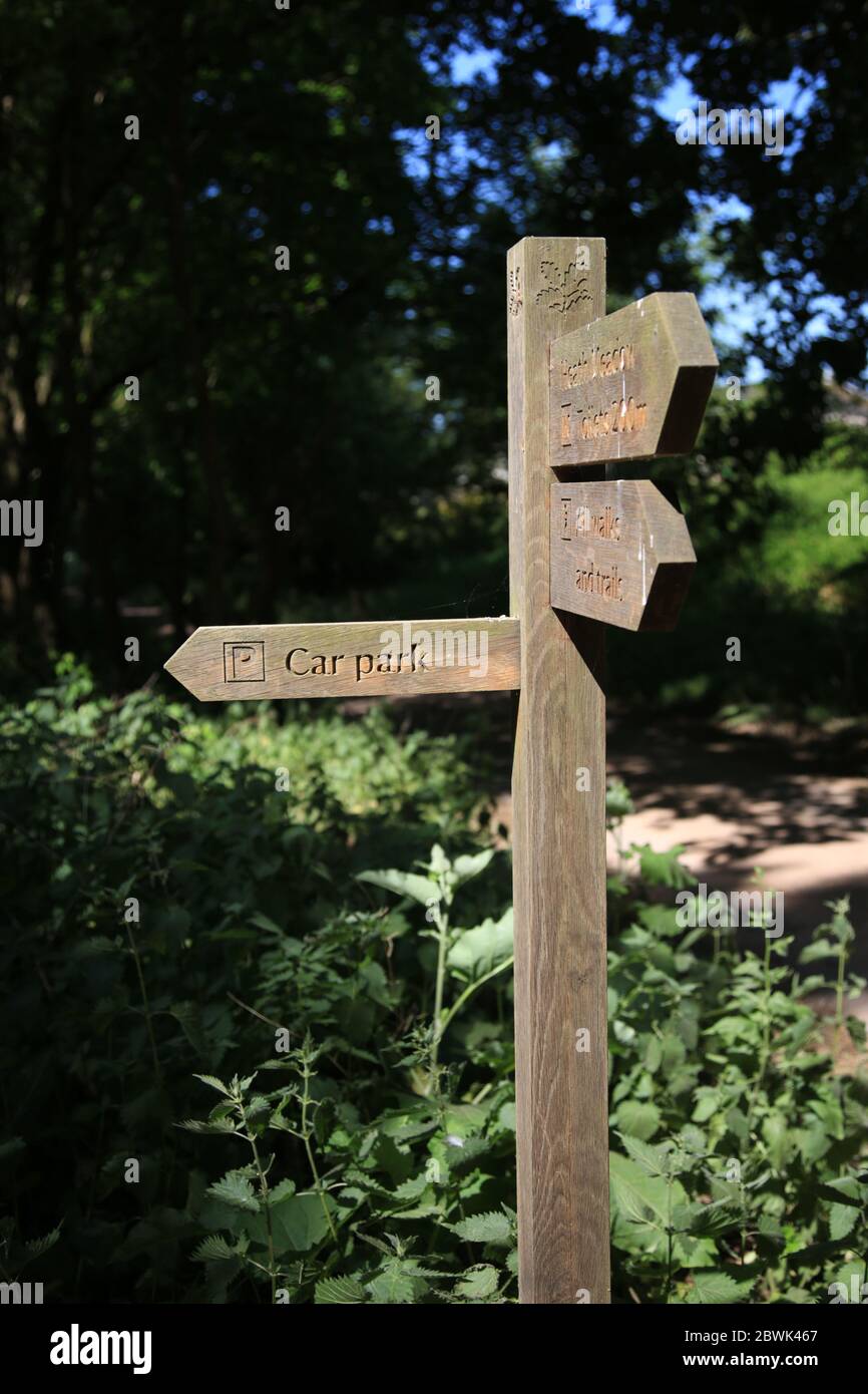 National trust signpost in Comer wood, Dudmaston estate, Shropshire, UK. Stock Photo