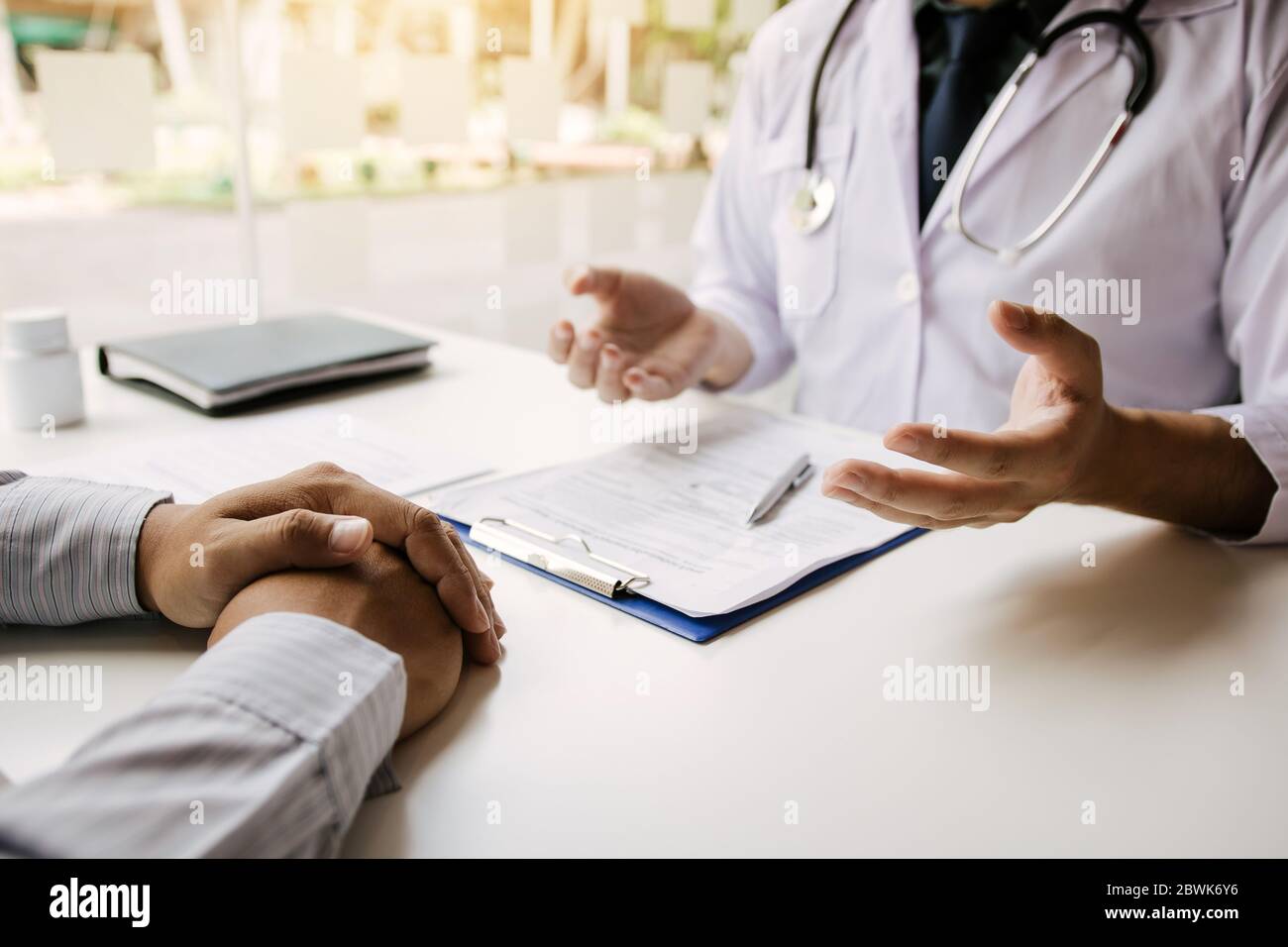 Doctor talking to the patient about menopause and treatment in future