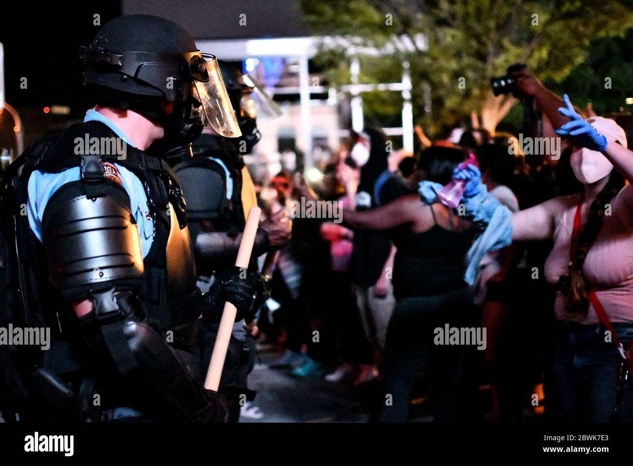 Atlanta, United States. 29th May, 2020. Police in riot gear stand guard ...