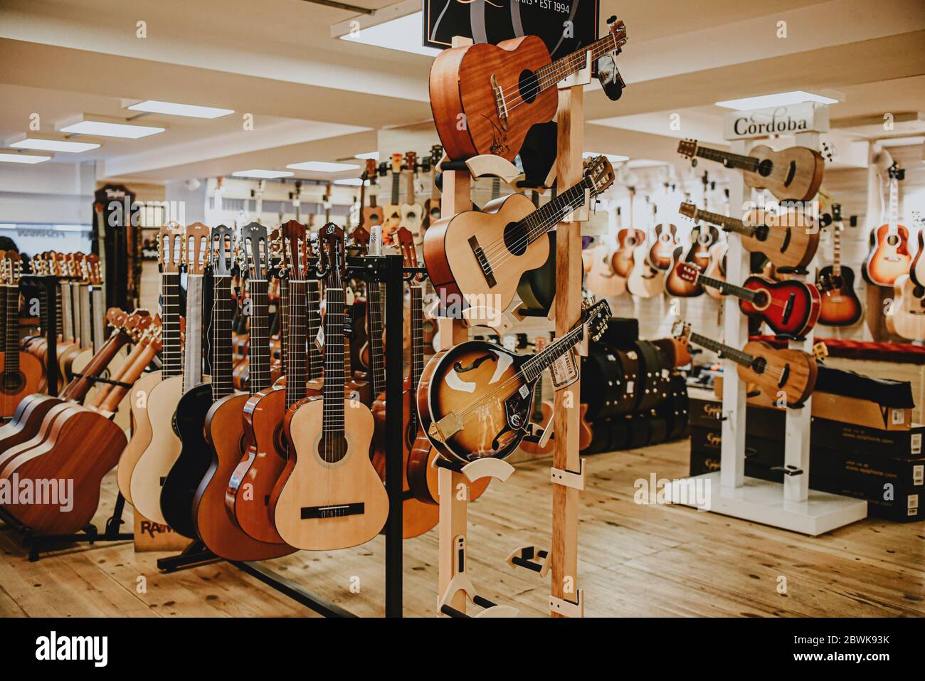 Istanbul Turkey 1 November 2019 variety a huge selection of acoustic guitars in the music store window Stock Photo