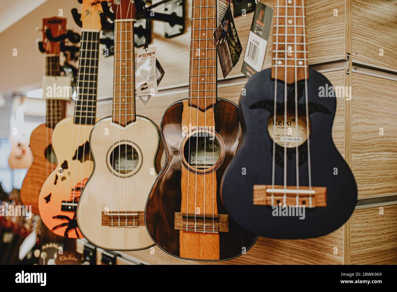 Istanbul Turkey 1 November 2019 variety a huge selection of acoustic guitars in the music store window Stock Photo