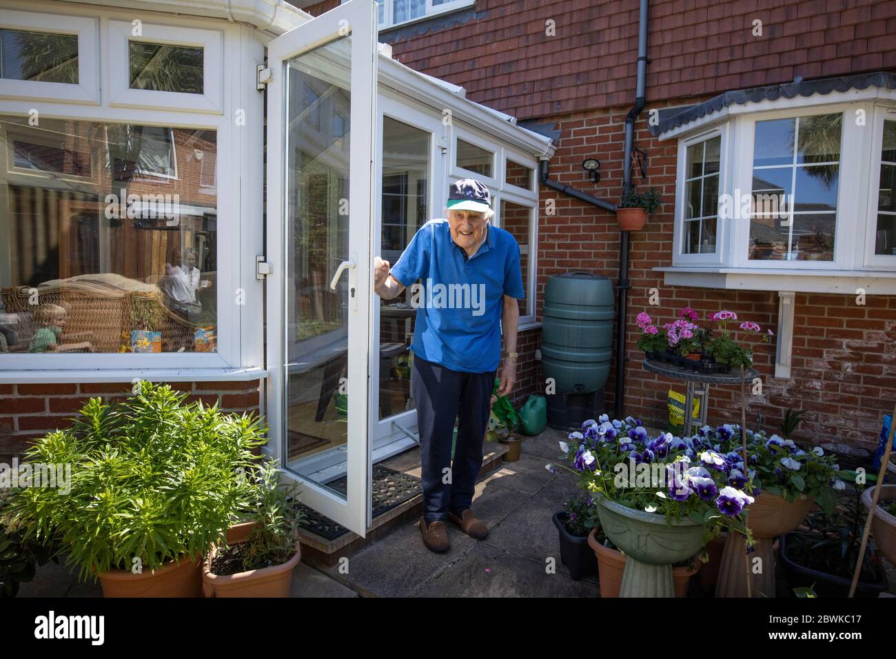 Eighty year old elderly man living at home during the coronavirus lockdown, England, United Kingdom Stock Photo