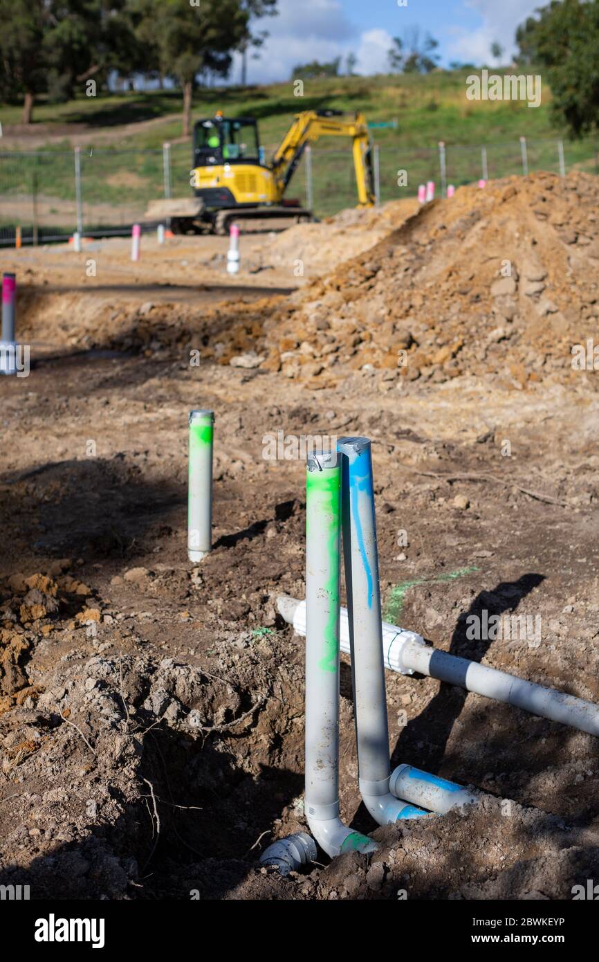 Underground plumbing pipes on a residential building site in Melbourne Australia Stock Photo