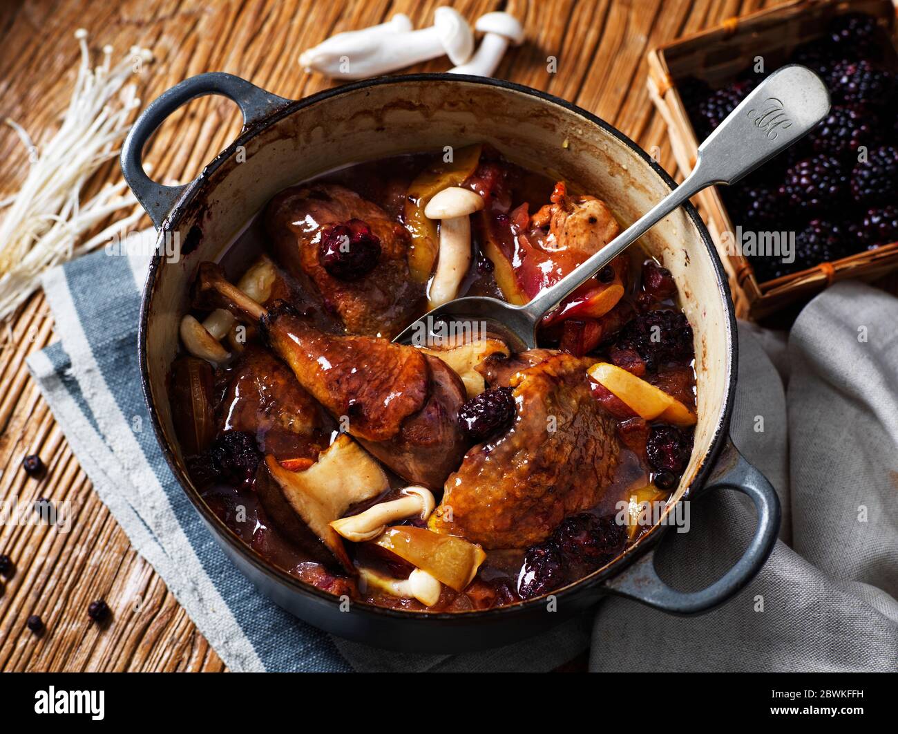Traditional British Braised Pheasant with Berries and Mushrooms, home cooked meal Stock Photo