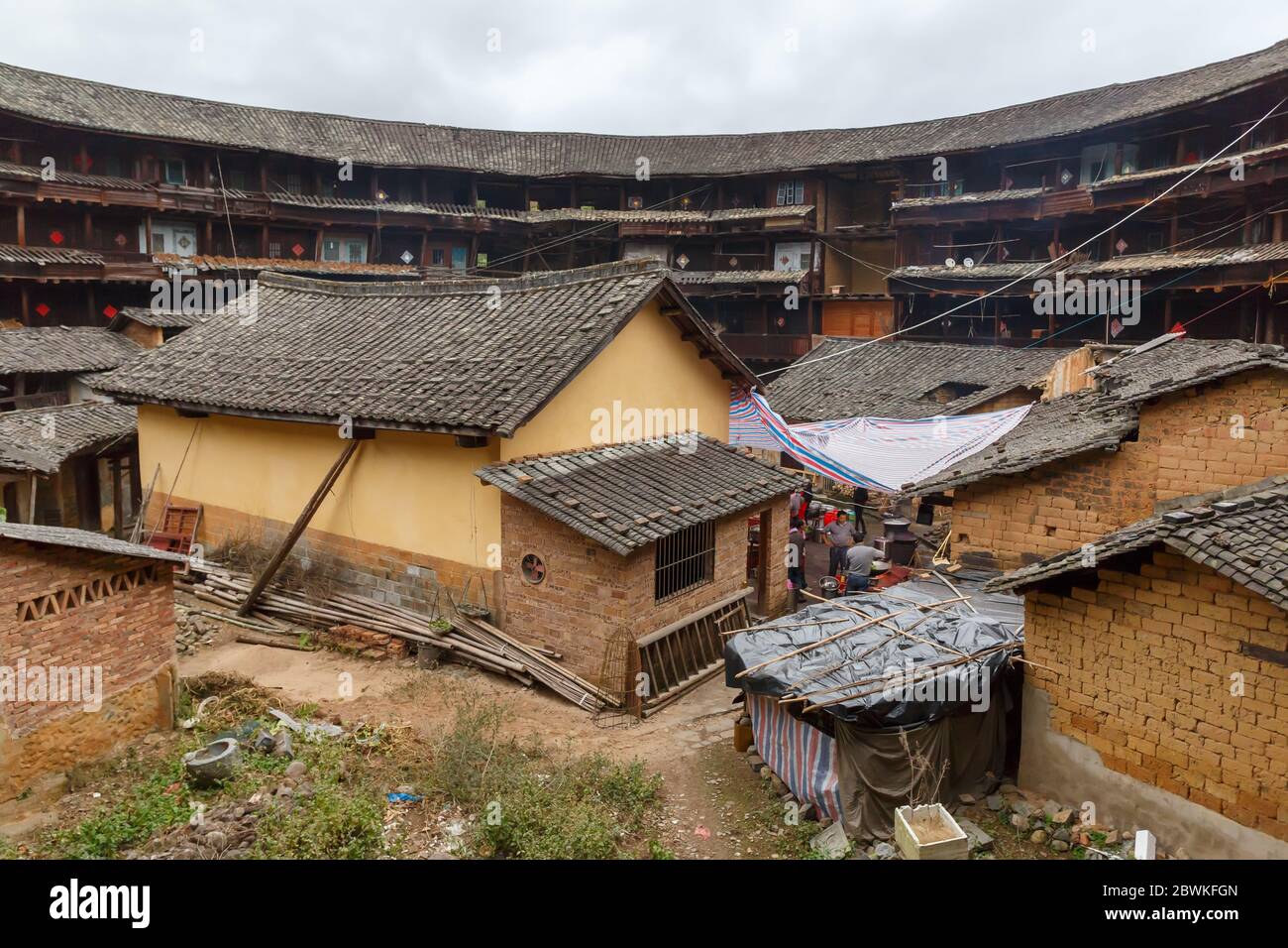 View on the inner structures of a Fujian Tulou (chinese:福建土楼). Traditional houses of the Hakka people. Stock Photo