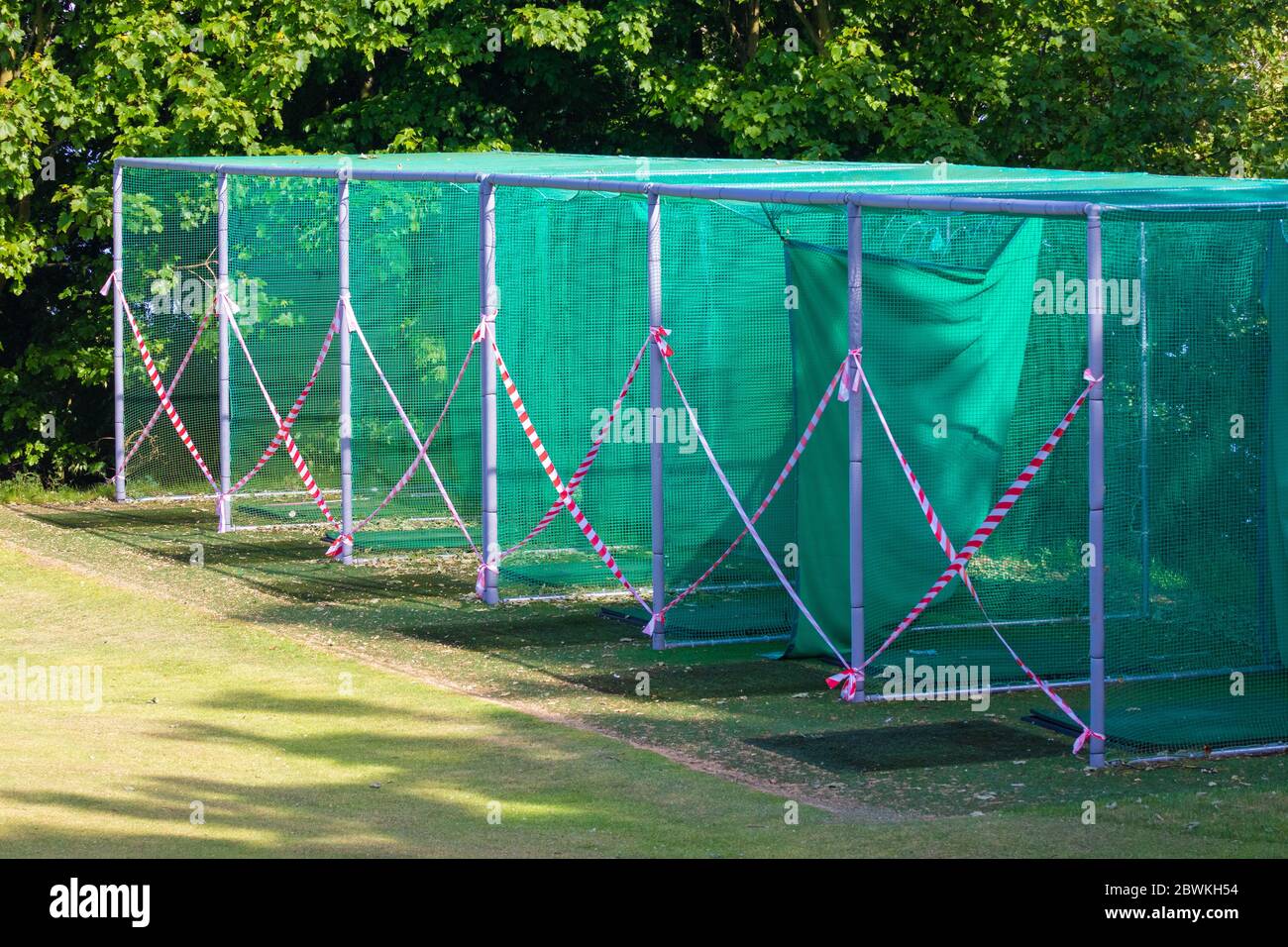 Taped off golf practice nets because of the lockdown in Scotland. Stock Photo