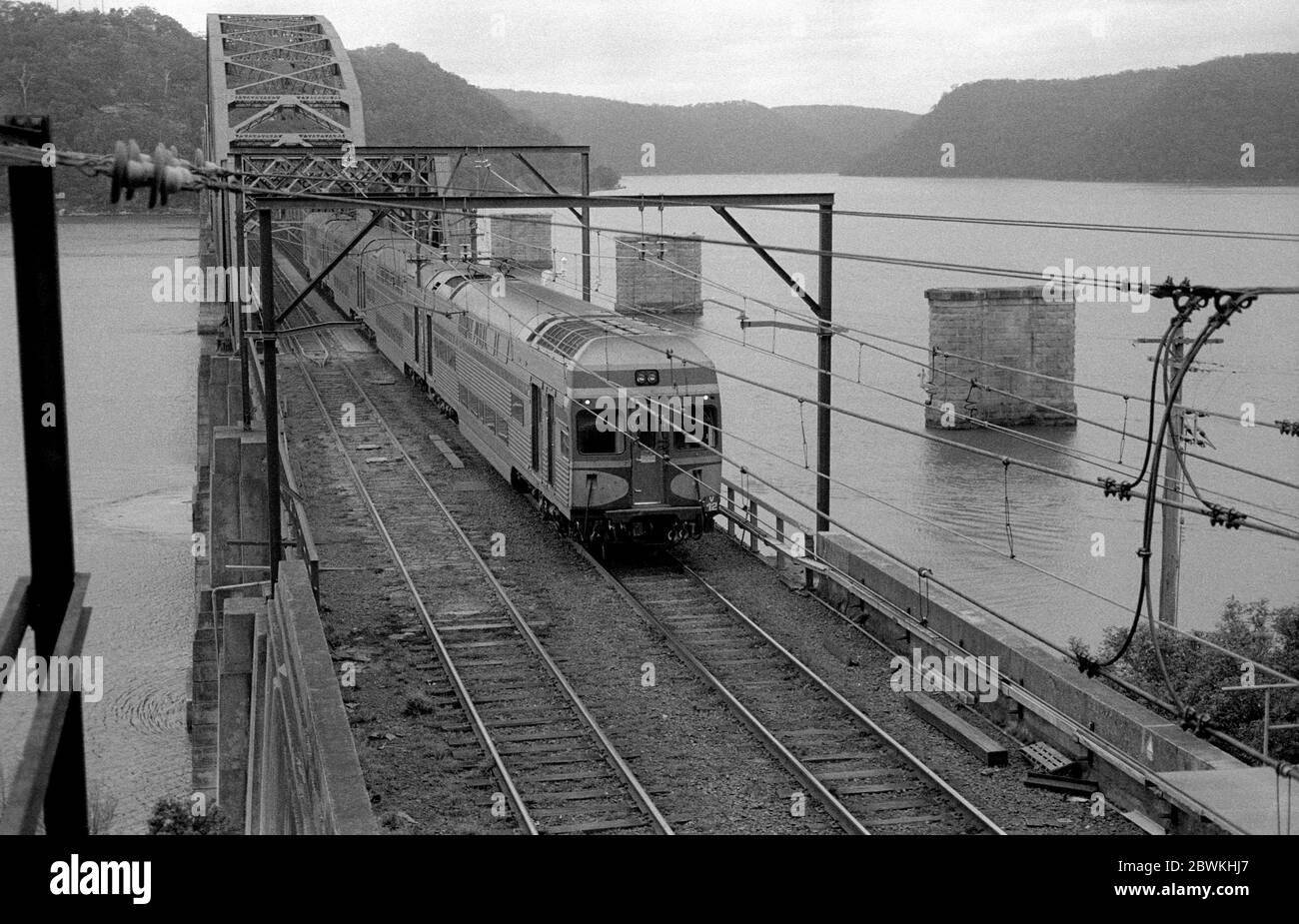 A Goninan suburban electric train crossing the Hawkesbury River Bridge, New South Wales, Australia. 1987. Stock Photo