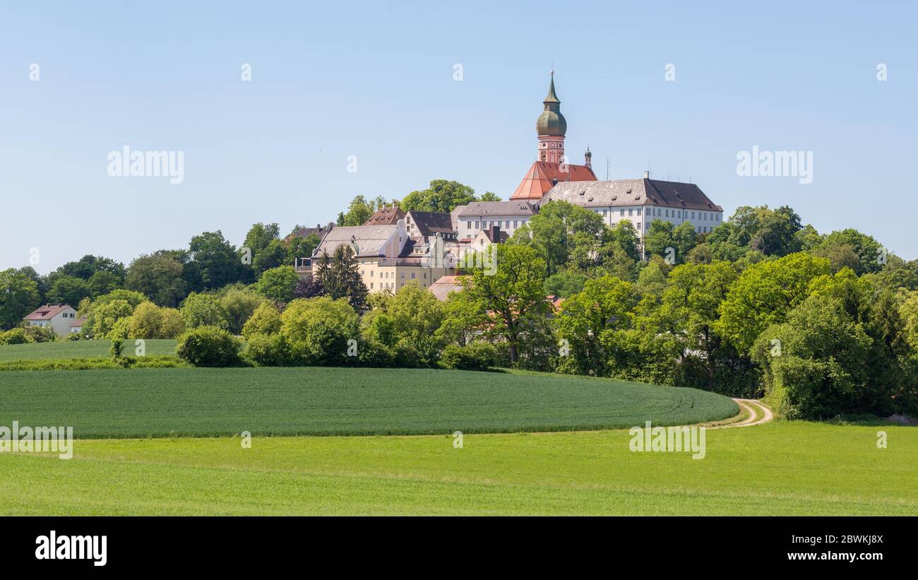 Panorama landscape with Andechs Abbey and lush green fields Stock Photo