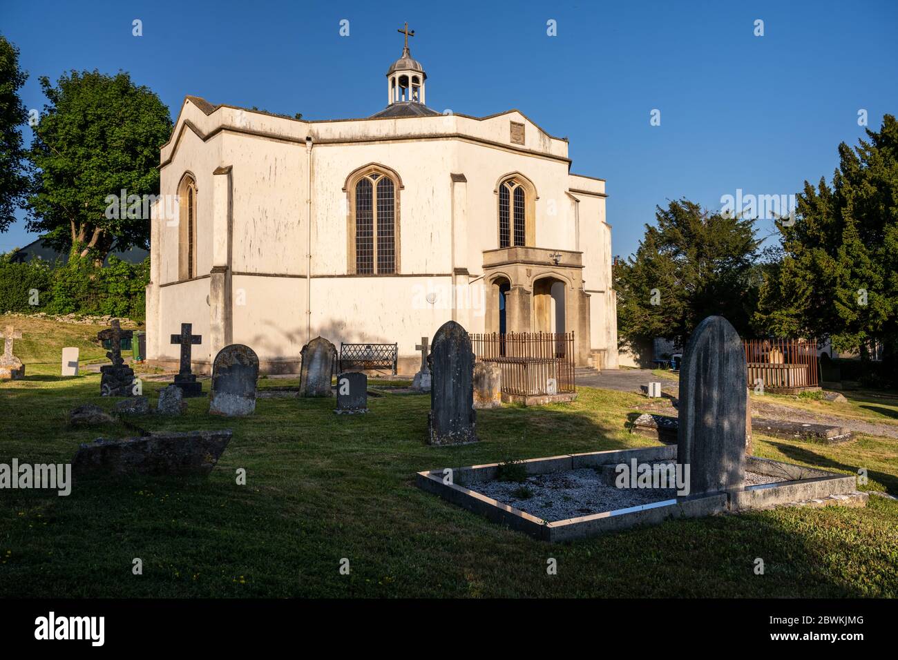 Wedmore, England, UK - May 31, 2020: Sun shines on Holy Trinity Church in the village of Blackford in Wedmore, Somerset. Stock Photo