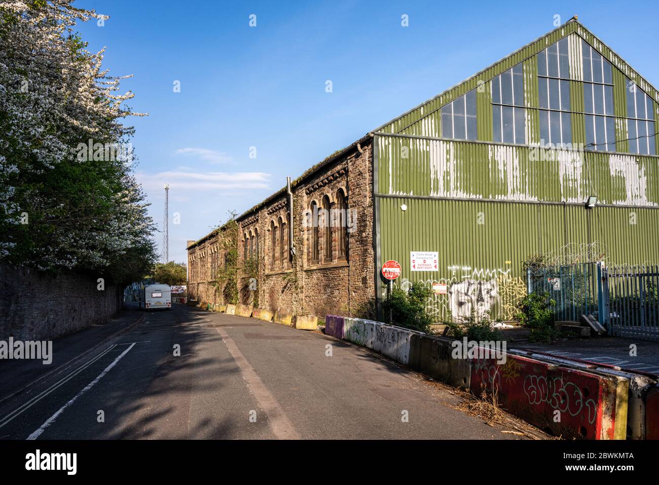 Bristol, England, UK - April 11, 2020: Disused light industrial warehouses await regeneration on Silverthorne Road in Bristol's Temple Quarter Enterpr Stock Photo