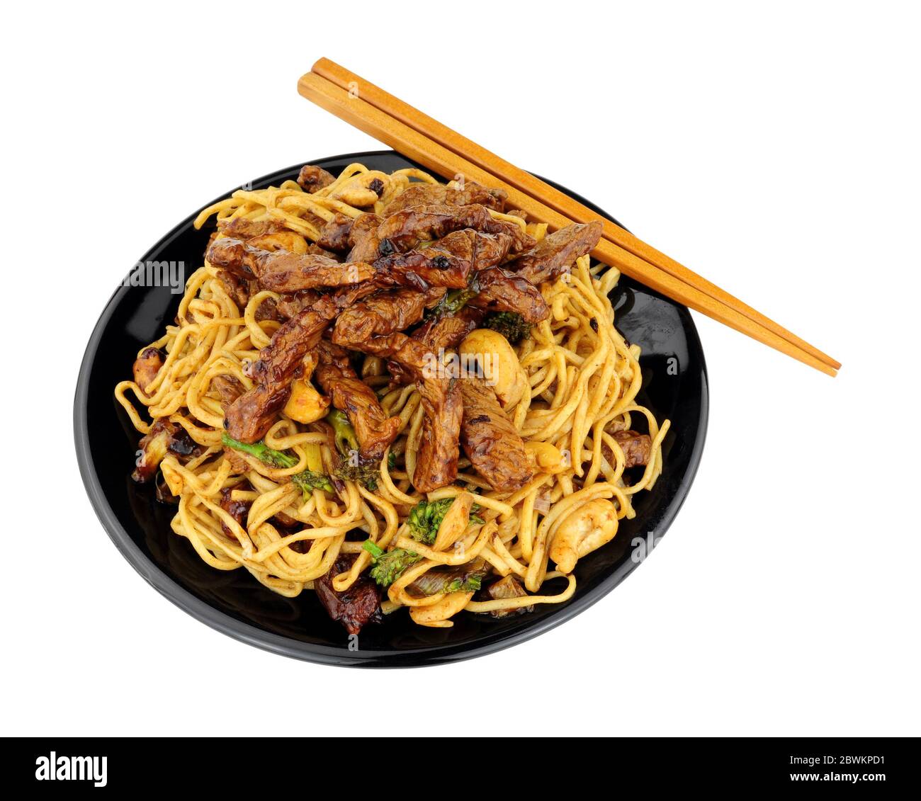 Beef in black bean sauce with egg noodles and cashew nuts meal isolated
