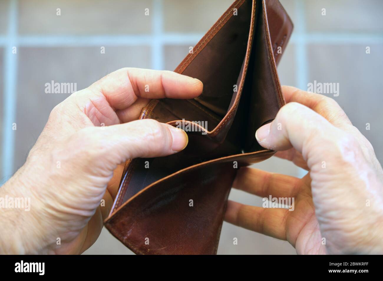 foreground of empty leather wallet Stock Photo