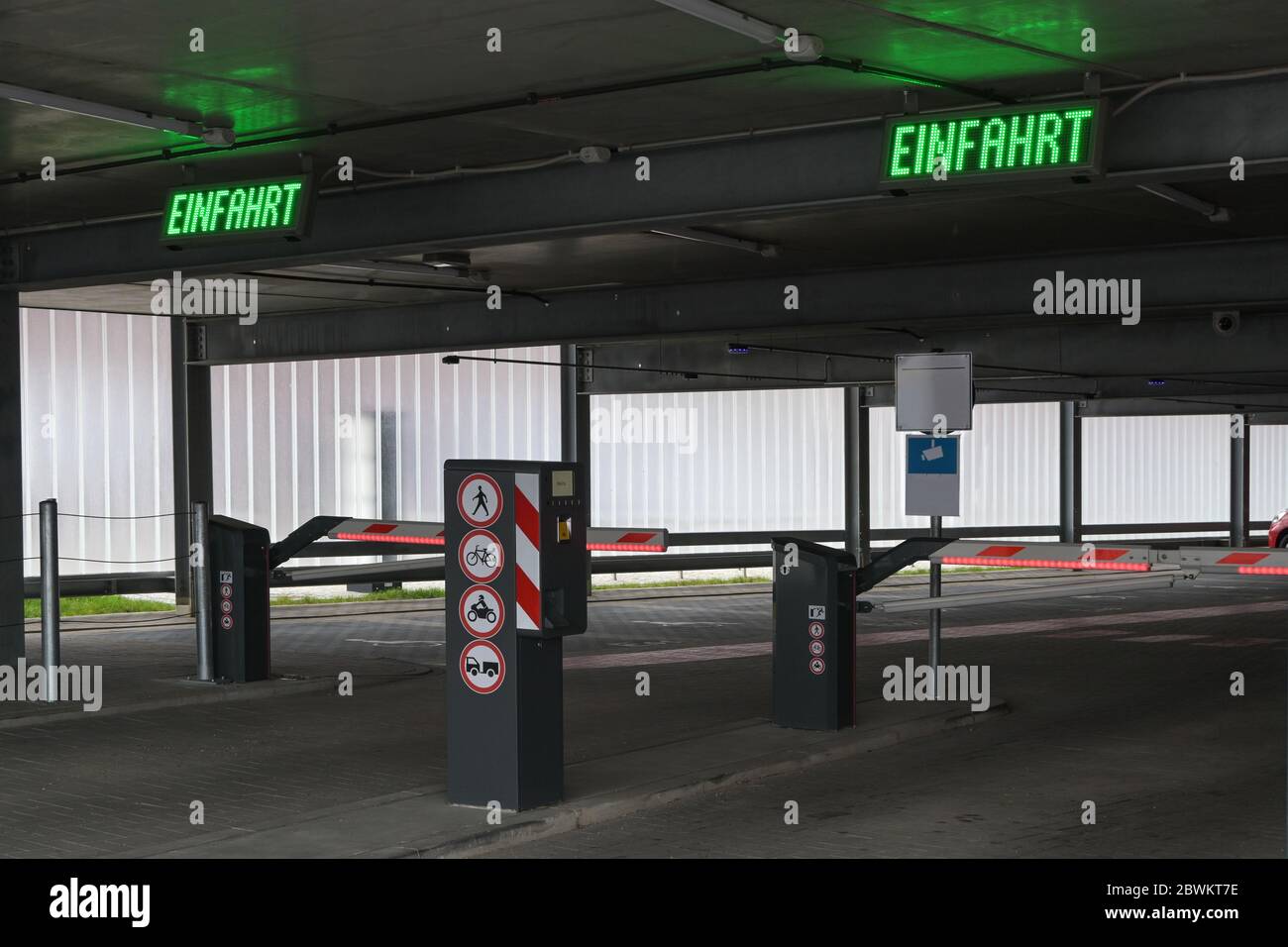 Multistorey car park or parking garage with barriers and parking