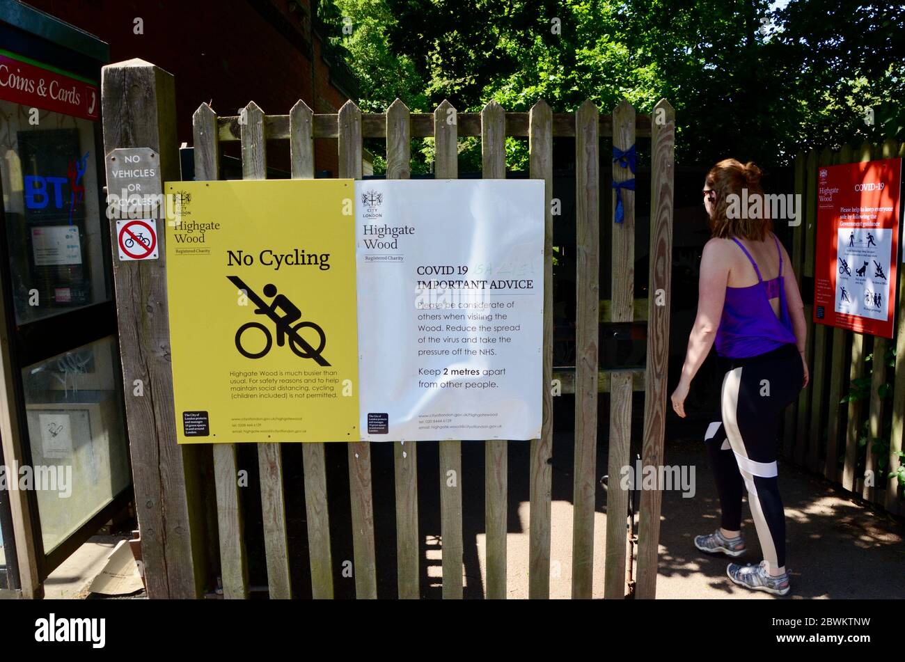 highgate wood london england covid 19 pandemic 2020 no cycling and government guidelines signs Stock Photo