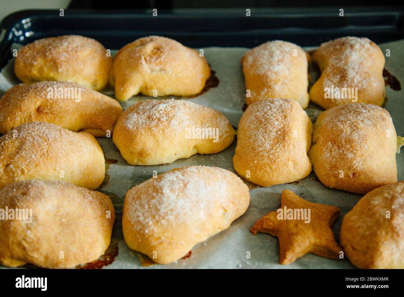 Russian pirozhki baked patties stuffed with apples Stock Photo