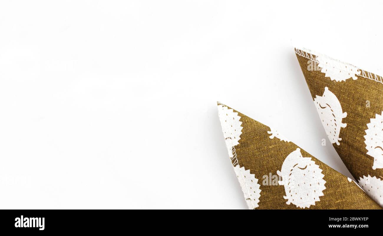 Easter ears from a green napkin for table setting Stock Photo