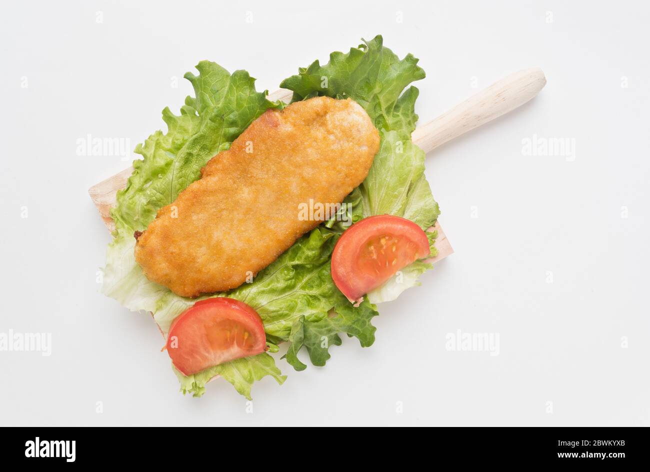 The cachopo consists of two large veal fillets, including Serrano ham and cheese. The whole is eaten fried and hot after being breaded in egg, flour a Stock Photo
