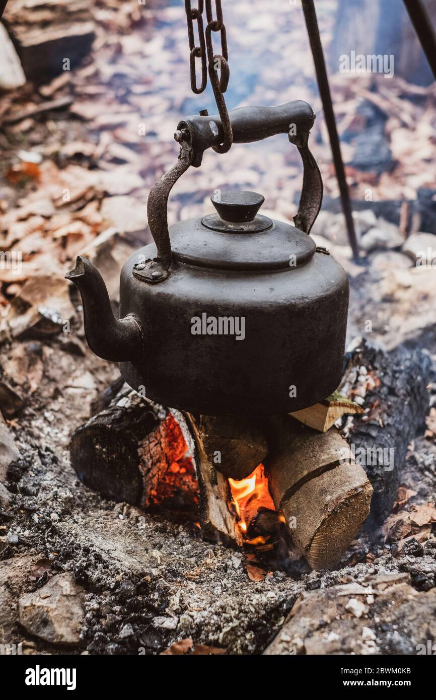 Camping kettle over campfire close hi-res stock photography and images ...