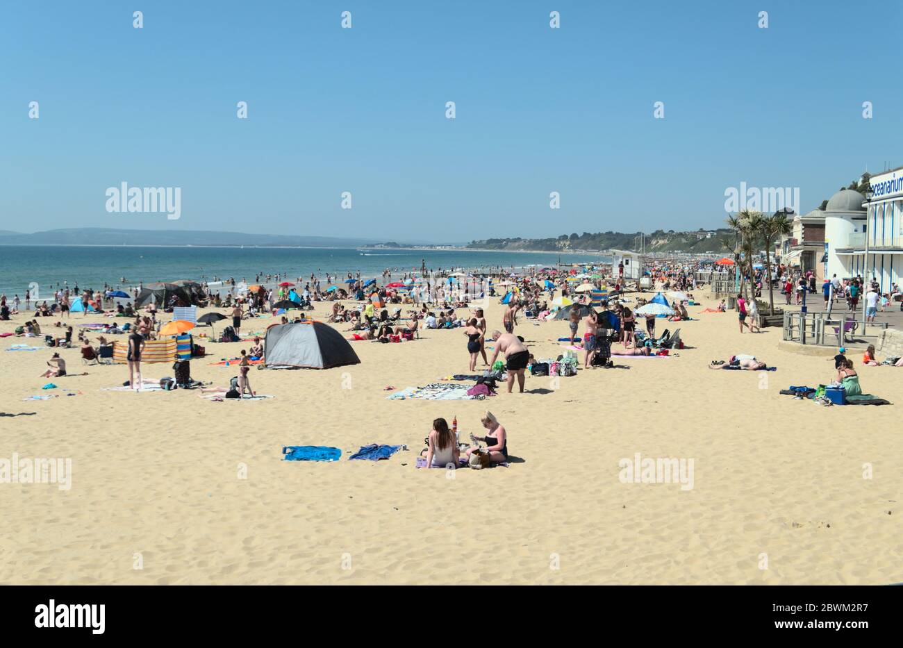 Bournemouth, Dorset / UK - May 30 2020: Sunbathers flock to Bournemouth beach as lockdown restrictions are eased. Stock Photo