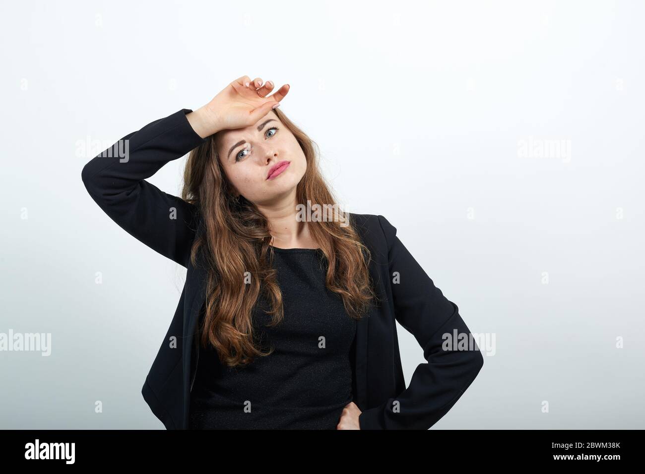 Headache grimacing, pain holds front of the forehead indicating ...