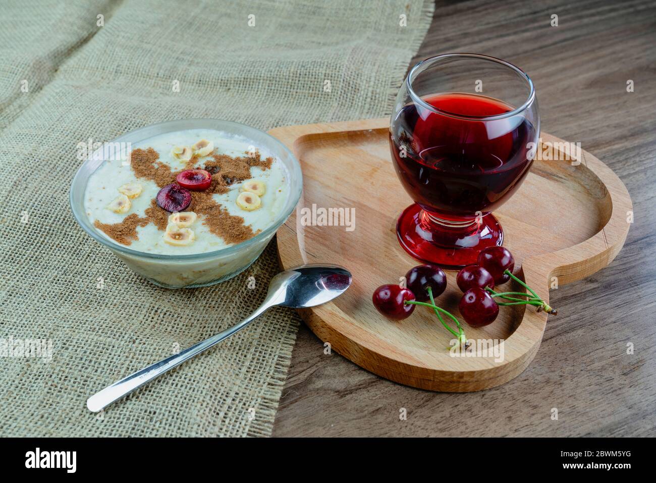 Traditional Turkish dessert, milk fermented with dried figs. 'Fig sleep' is a local sweet obtained by the fermentation of dried figs milk. Serving des Stock Photo