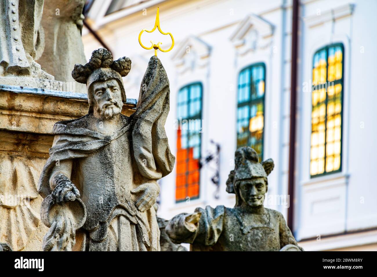 Veszprem, Hungary. Fountain decoration statues in Veszprem, Hungary. Historical buildings at the background Stock Photo