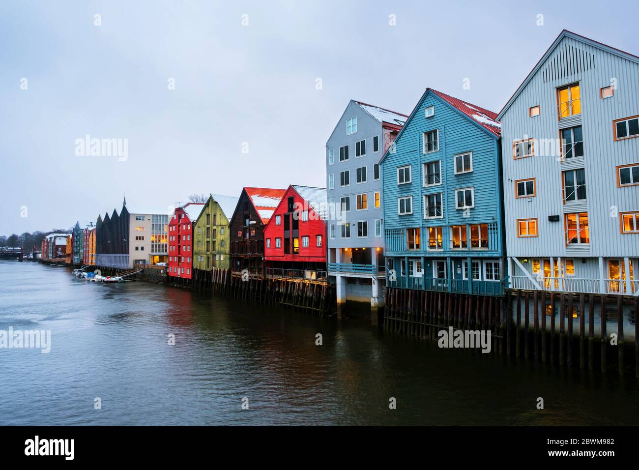 Trondheim, Norway. City center of Trondheim, Norway during the cloudy winter day. Historical colorful building and grey cloudy sky Stock Photo