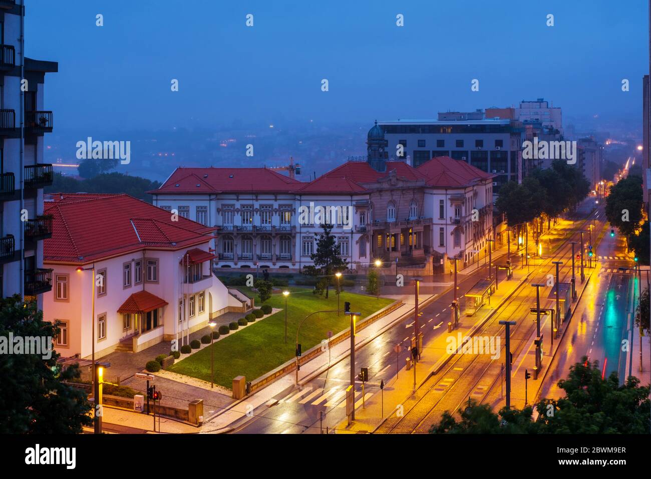 Gaia, Portugal. Aerial view of historical buildings in Gaia, Portugal at night. Porto city at the background Stock Photo