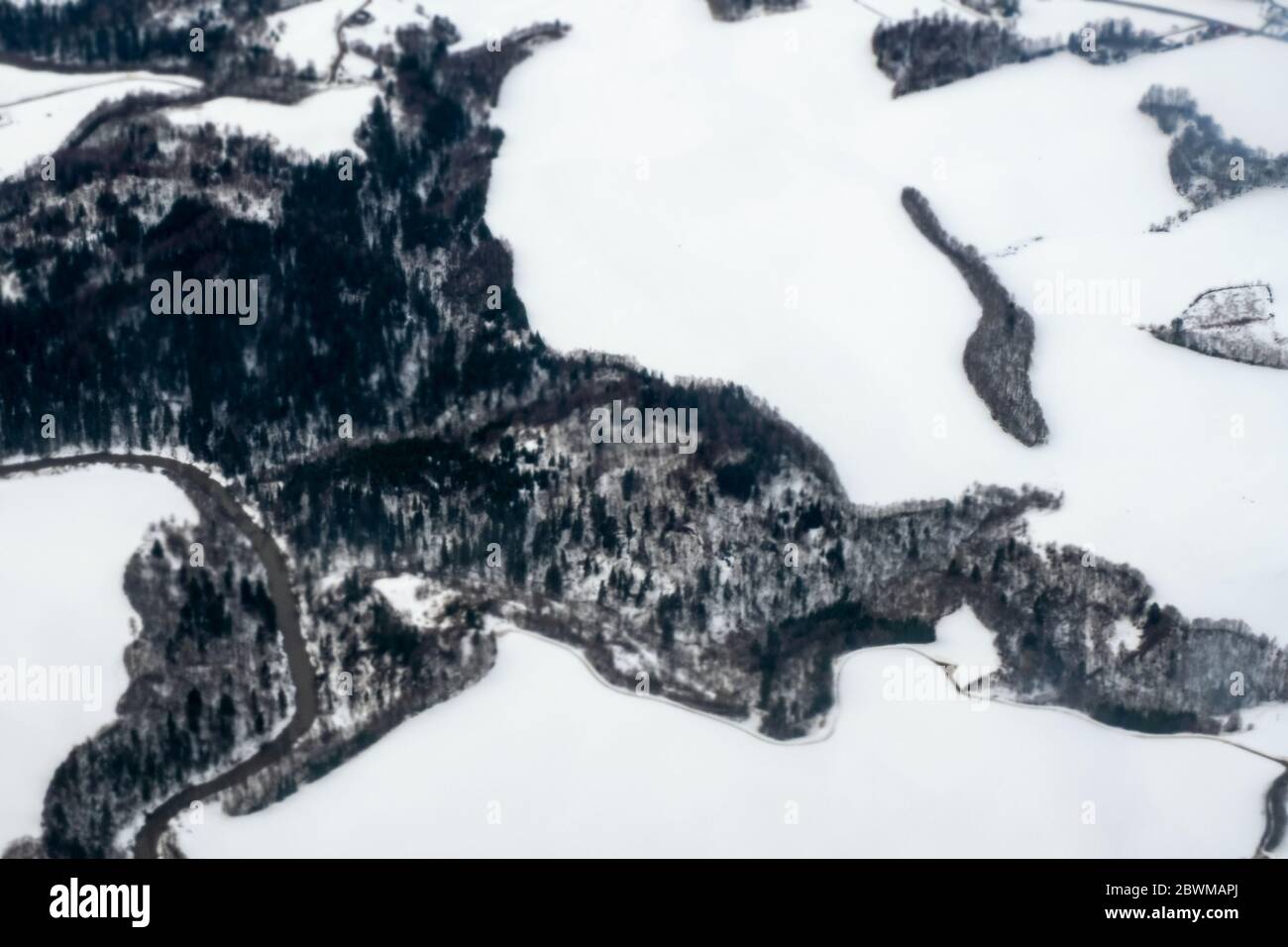 Norway. Abstract. Aerial view of snowy landscape in winter with forest in Norway. Blurry abstract, background Stock Photo