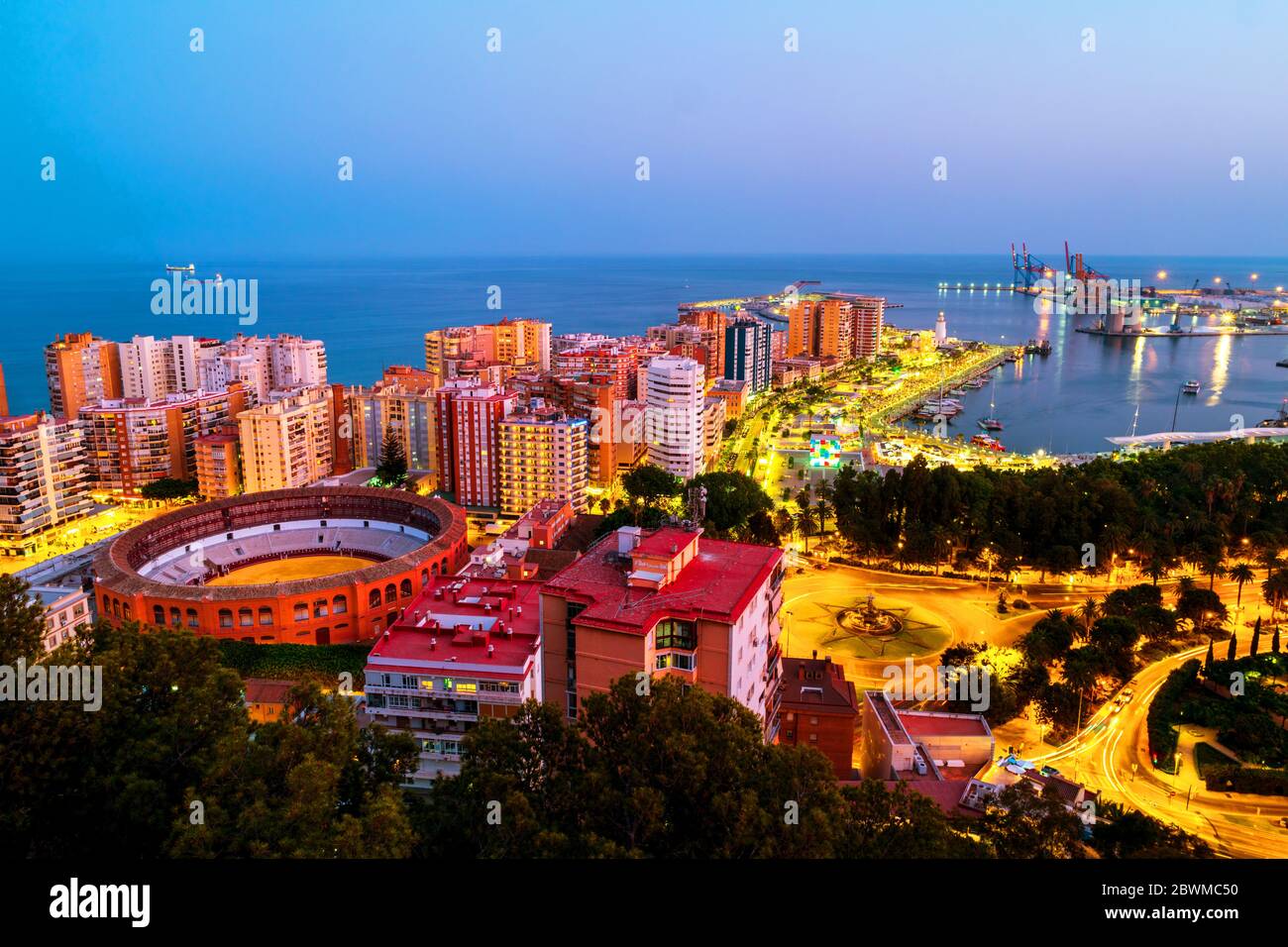 Malaga, Spain. Aerial view of the city center at sunset with bullring