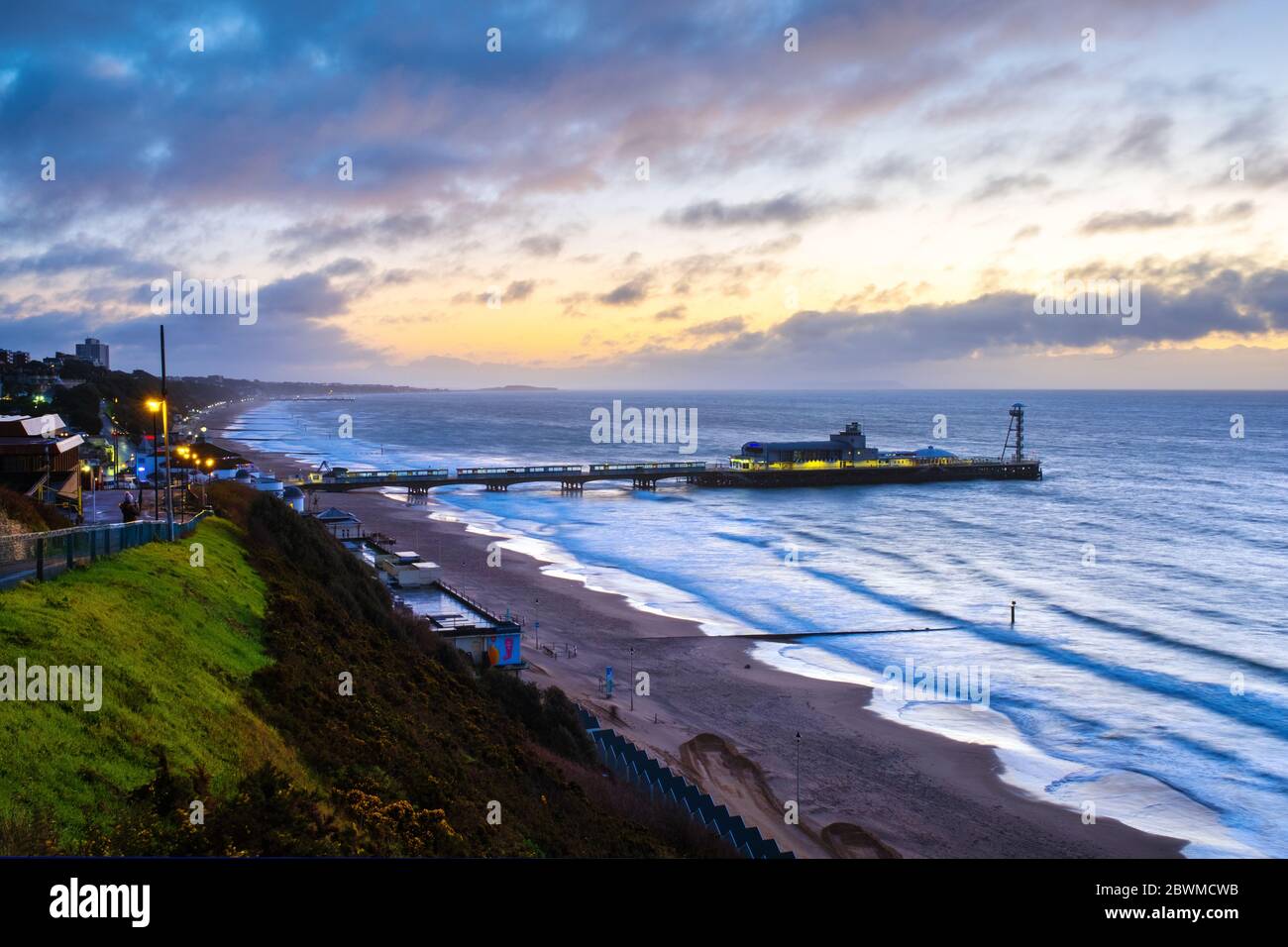 Bournemouth, UK. Aerial view of famous Pier in Bournemouth, England, UK during the sunrise. Waves of the sea and the beach Stock Photo