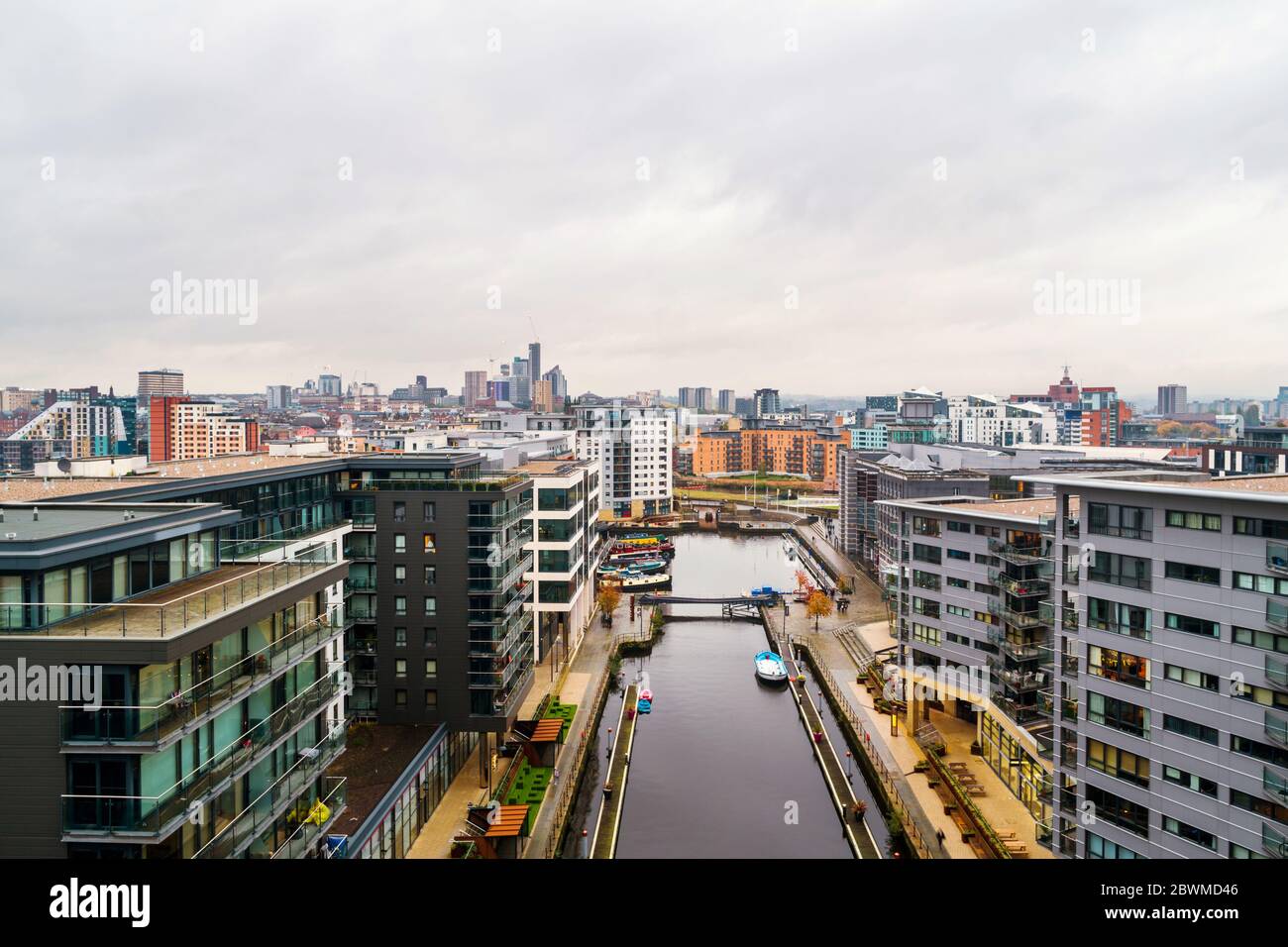 Leeds, UK. Aerial view of Leeds docks, England, UK. Heavy clouds over the modern buildings, apartments in the evening Stock Photo