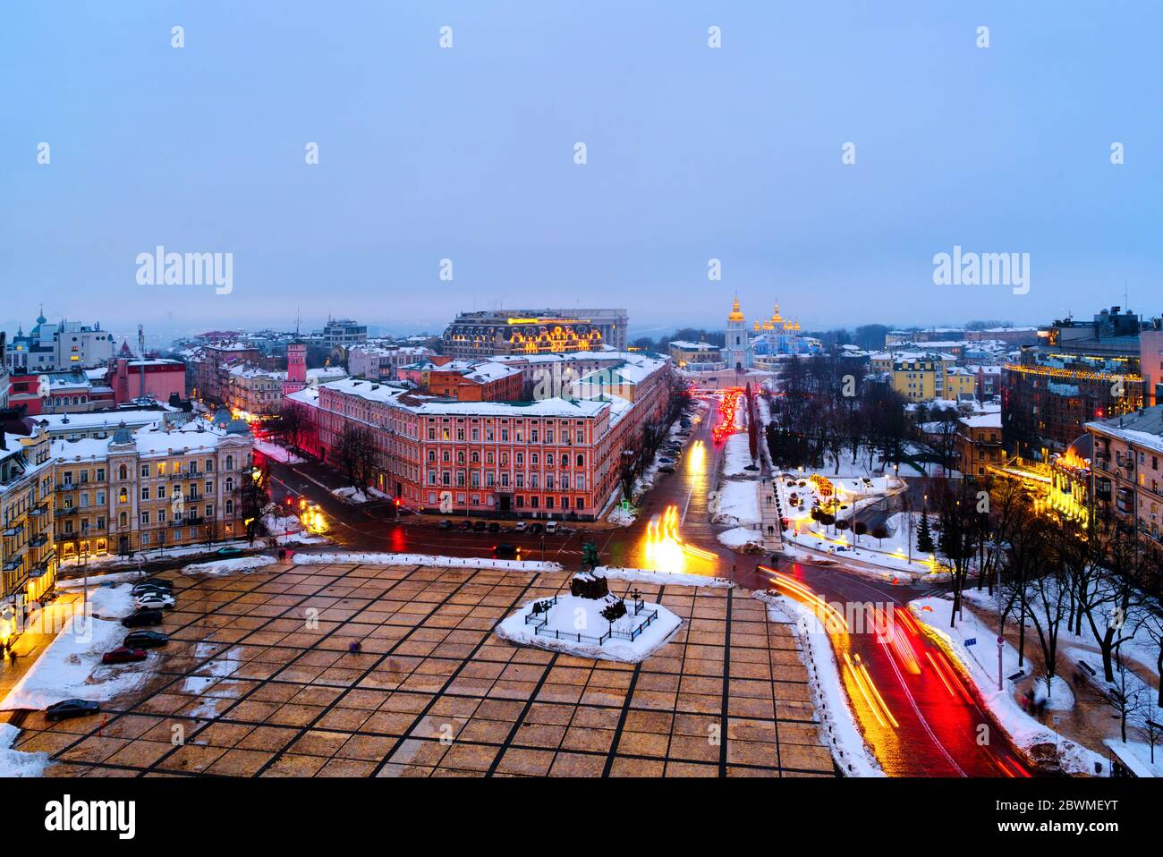 Kyiv, Ukraine. Aerial view of Kyiv, Ukraine, with a view of the St Michaels Golden - Domed Monastery and traffic on a winter evening with a gloomy sky Stock Photo