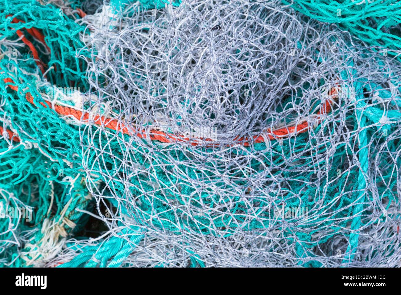 Fishing nets lying in a heap Stock Photo