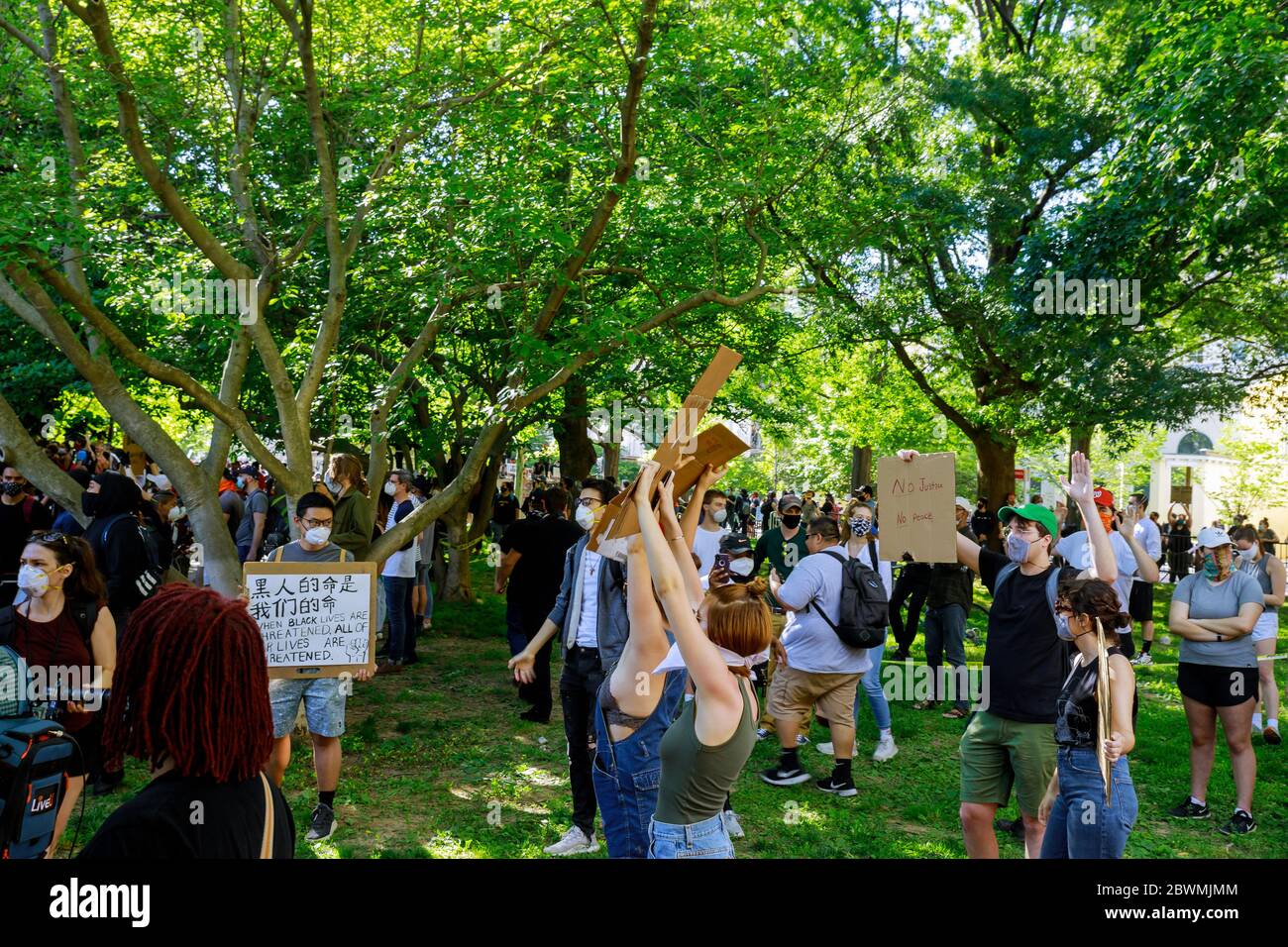 WASHINGTON D.C., USA - MAY 31, 2020: Protesters march in WASHINGTON D.C. during a rally responding to the death of Minneapolis man George Floyd at the hands of police on White House president Donald Trump Stock Photo