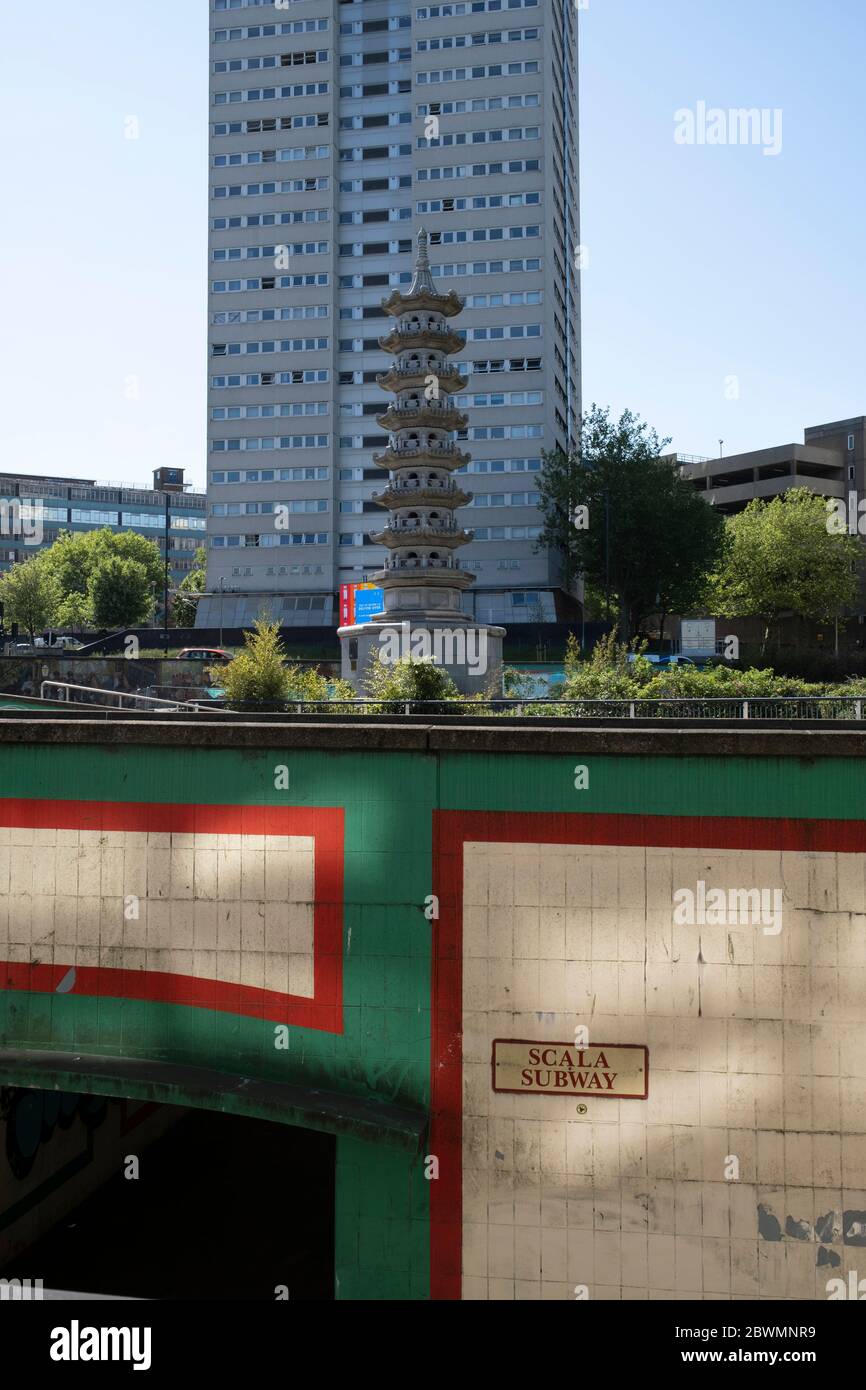 Holloway Circus, where new buildings juxtapose the old pagoda in the city centre of Birmingham virtually deserted under Coronavirus lockdown on 20th May 2020 in Birmingham, England, United Kingdom. This area is a maze of underpasses and pedestrian subways linking various main roads in the city centre. Coronavirus or Covid-19 is a new respiratory illness that has not previously been seen in humans. While much or Europe has been placed into lockdown, the UK government has put in place more stringent rules as part of their long term strategy, and in particular social distancing. Stock Photo