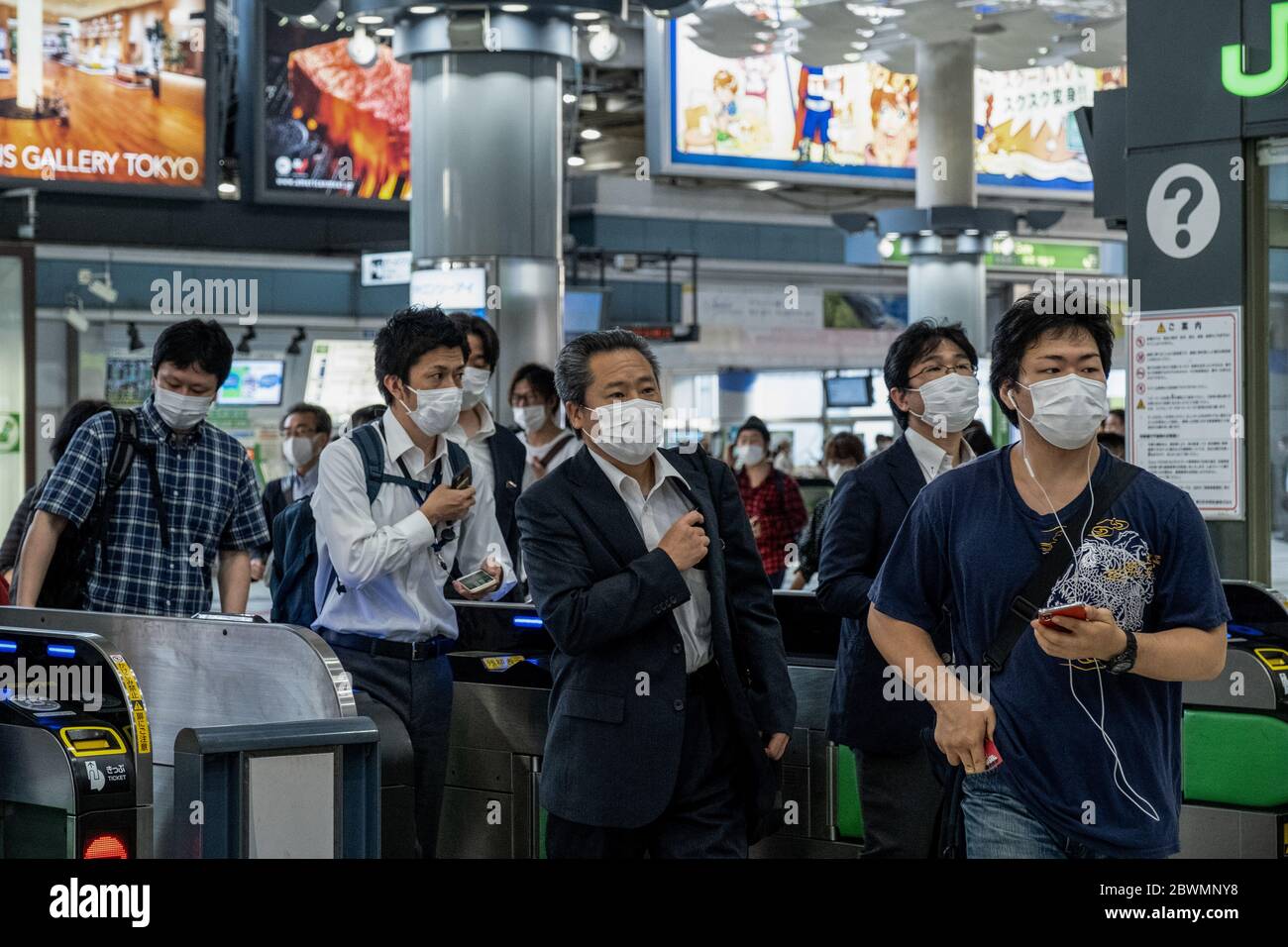Tokyo, Japan. 02nd June, 2020. People walking inside the Shingawa Station seen wearing face masks as a precaution against the spread of coronavirus.Japan government lifted Coronavirus State of Emergency last week. Tokyo Governor Yuriko Koike is set to issue what she has dubbed a 'Tokyo Alert' if cases continue to climb, the city has said it may call for people to stay home again. Japan Health Ministry recorded a total of 16,884 infections, 892 death and 14,502 recovered since the beginning of the outbreak. Credit: SOPA Images Limited/Alamy Live News Stock Photo