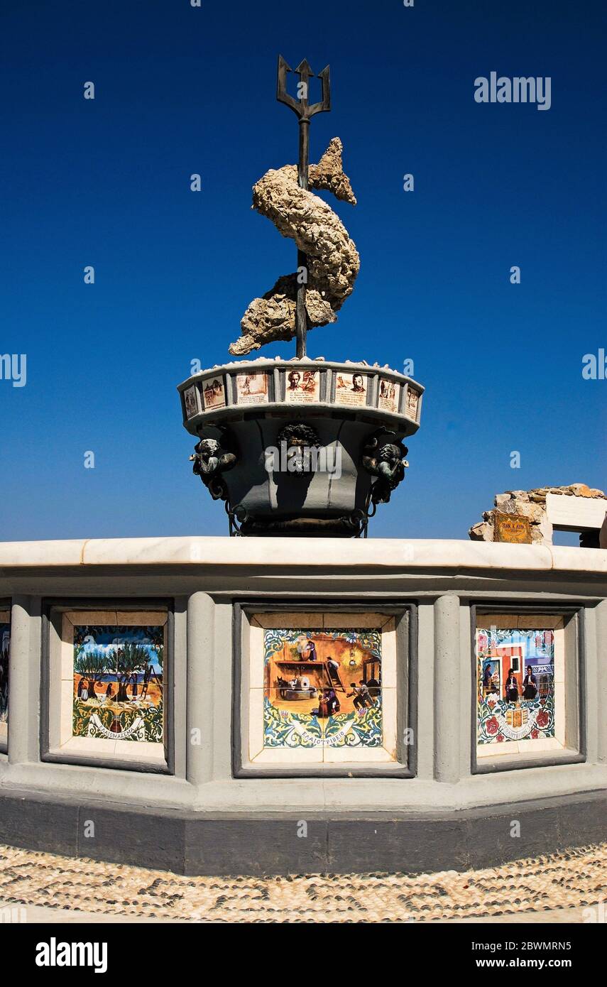 Greece, Karpathos island, August 16 2008 - Fountain with nice ceramic decorations at the port of Diafani. Stock Photo