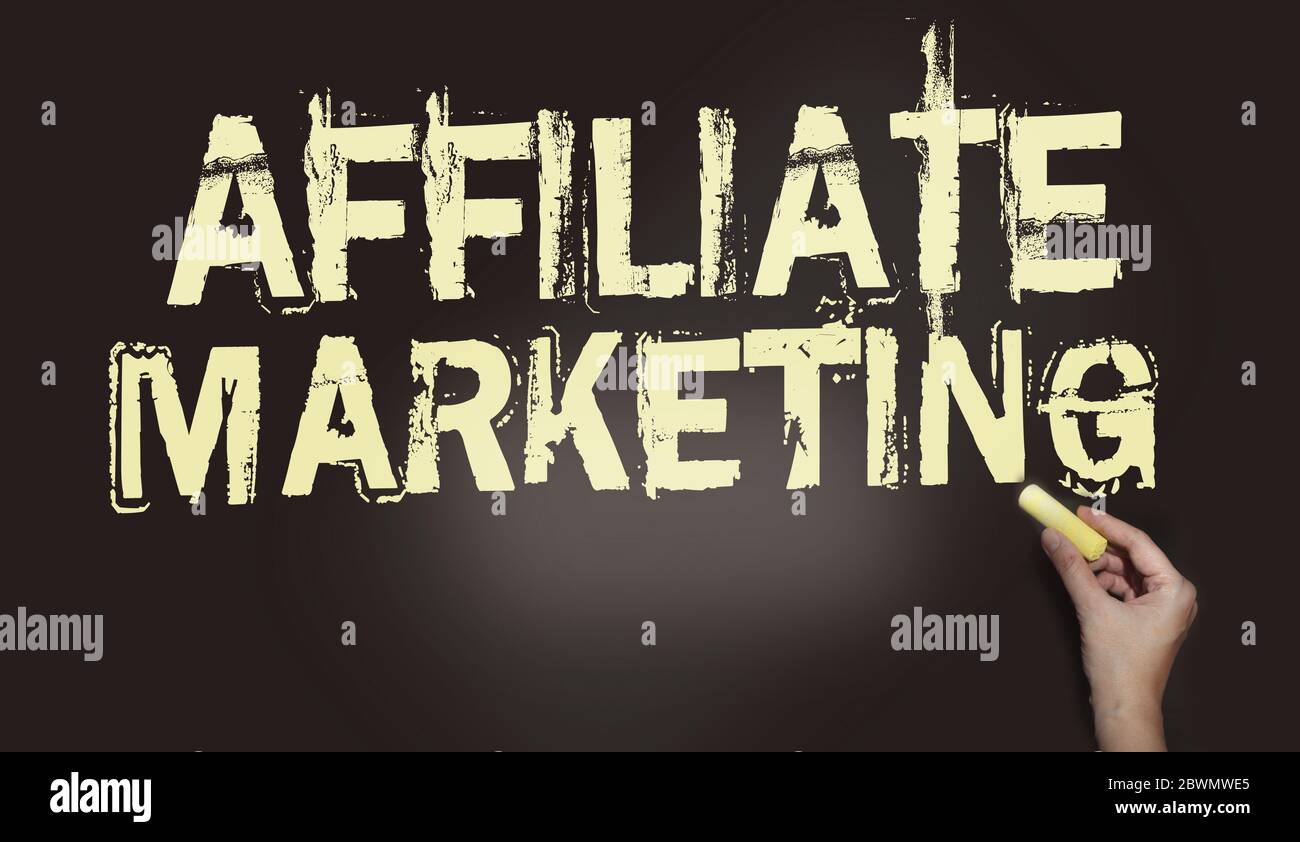 Affiliate Marketing - words written with chalk on blackboard. Business model concept Stock Photo