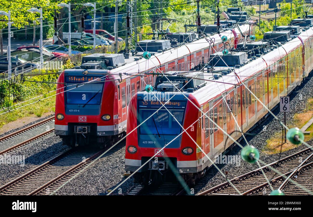 S-Bahn trains in morning rush hour at Bad Homburg station near Frankfurt am Main Stock Photo